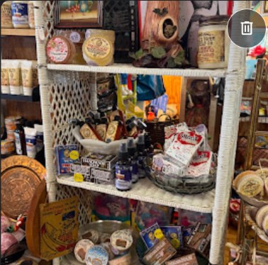 Shelf filled with collectibles and vintage pieces